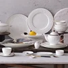 /product-detail/luxury-white-embossing-crockery-ceramic-bone-china-porcelain-gold-rim-dinnerware-sets-62404387325.html