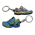 Free artwork fashion enamel rubber keychain no minimum order custom logo souvenir key ring 3d keychain shoes