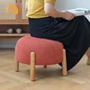 /product-detail/modern-living-room-dining-room-contracted-velvety-sofa-low-stool-household-wooden-foot-stool-portable-round-stool-62422363928.html