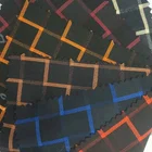 hot selling Dyed woven T/R polyester red plaid men fabric stock lot