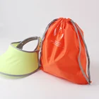 orange color nylon drawstring bag for hat packaging custom material