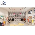 Hot Sale Kids Bodysuit Display Furniture Design Baby Clothes Store Interior Design with Lighting
