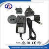 interchangeable plug UK/EU/US sockets 12V 1A wall mounted AC/DC adaptor 5.5*2.1mm DC jack