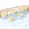 Hot selling 5g 50 ml 100ml frosted clear glass cosmetic jar with wood color PP cap