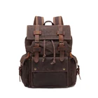 Modern and elegant in fashion vintage canvas backpack with leather trim
