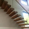 Floating Walnut Stairs with Glass Balustrade