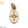 /product-detail/oval-jewelry-charms-making-customized-small-gold-stamped-logo-metal-pendant-for-bracelet-62094698418.html
