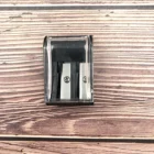 Double holes rectangular plastic pencil sharpener with cap