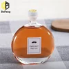 /product-detail/new-flat-round-empty-ice-wine-glass-bottle-beverages-glass-bottle-red-wine-bottle-250ml-500ml-62109691384.html