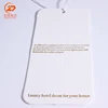 Cheap custom thick white cardboard paper hang tag with string for apparel