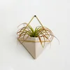 /product-detail/wholesale-triangle-hanging-half-wall-flower-pots-62116524632.html