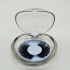 Putting on faux mink fan eyelashes for everyday