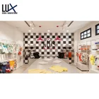 Fashion baby clothes shop design customized baby clothes display stand for kids shop decoration