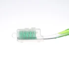 Disposable plastic manufacturer soft toothbrush with cap