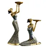 /product-detail/resin-african-figurine-statue-woman-candle-holder-home-62075911759.html