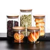 Decorative kitchen borosilicate glass storage jar with airtight wood lid