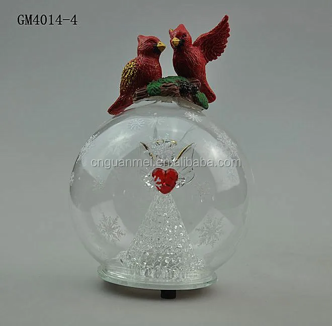 large decorative glass balls with angel inside