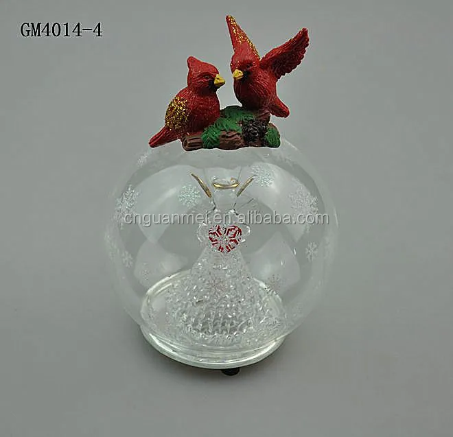 large decorative glass balls with angel inside