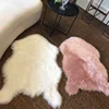 /product-detail/factory-wholesale-home-decor-faux-sheepskin-long-pile-fur-rugs-white-fur-carpet-for-living-room-with-cheap-price-60788572628.html