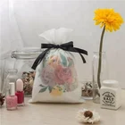 Plastic Non Woven White Color Flower Small Drawstring Bags Packing Gift