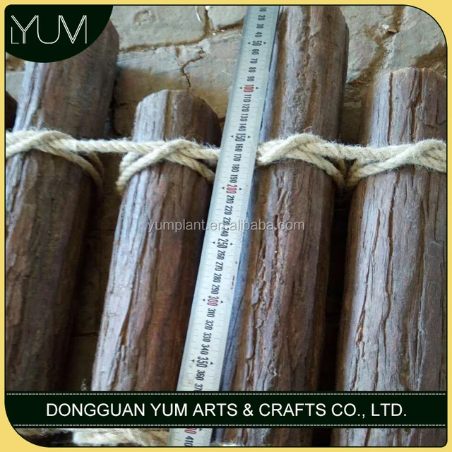 artificial tree trunk with hemp rope for background decoration