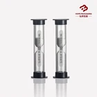 purplish red glass sand timer, hourglass