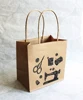 Strong brown small kraft paper sewing gift bag with twisted paper handles