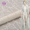 /product-detail/new-arrival-white-sequin-crystal-100-polyester-glitter-fabric-for-wedding-dress-60842975327.html