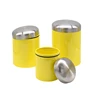 Three different size yellow kitchen canister set with silicone ring
