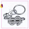 OEM fashion cheap metal clear crystals $ shaped keychain