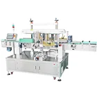 SKILT Automatic label applicator for flat bottle surfaces
