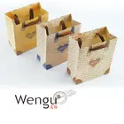 2014New Design Top sale customized brown paper shopping bag with heart shape