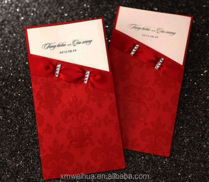 red chinese wedding invitation card with ribbon