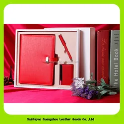 corporate anniversary gift set with business notebook , pen and