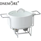 Round Ceramic Casserole dish on wire rack with lid for keeping food warm