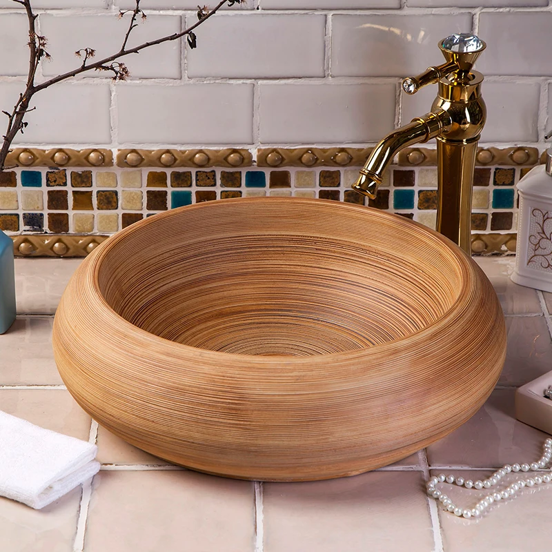 China Artistic Handmade Ceramic wash basin Lavobo Round Counter top ceramic chinese wash basin bathroom sinks (9)
