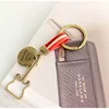 /product-detail/factory-outlet-retro-round-wallet-pendant-metal-keychain-maker-62024188894.html
