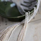 White Small Loose Freshwater Near Round Baroque pearls for sale natural