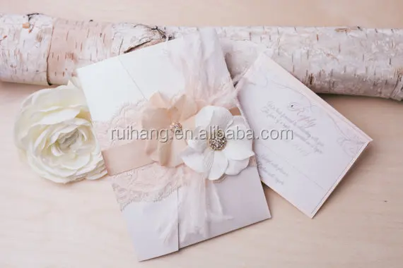 card lace with ribbon and royal flower wedding invitation card