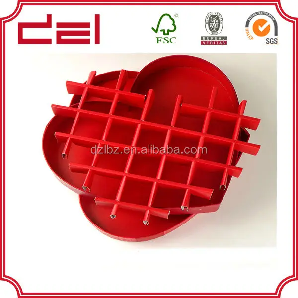 valentines day red heart shaped chocolate gift box with paper