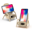 Multi-function Chair Shape Mobile Phone holder OEM Auto Fast Sound Reinforcement Wireless Charger With Physical Speaker
