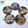 Classic plastic/resin tortoise shell button with four holes for coat