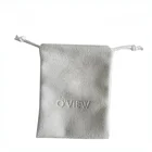 Cream sea-island material jewellery pouch with embossed logo