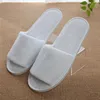 /product-detail/custom-logo-cheap-white-hotel-slipper-disposable-plain-embroidered-hotel-slippers-60753199534.html