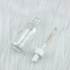 Clear Glass Boston Bottle With 20-410 Glossy Dropper Cap Glass Round