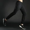 /product-detail/sports-trousers-casual-fitness-sliding-fabric-reflective-printing-cargo-pants-men-60810646171.html