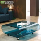 Movable blue color glass oval coffee table