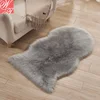 High quality wholesale natural home decorative sheepskin faux fur bedside rugs, synthetic sheepskin rug
