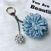 Wholesale Beautiful ladies crystal ball Keychains for bag car leather Flower shape Keyring
