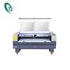 /product-detail/1800x1000mm-good-price-auto-feeding-working-table-wine-box-plexiglass-laser-cutting-cutter-machine-for-fabric-leather-60452166880.html